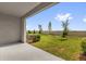 View of a lawn and fence as seen from the home's covered patio at 2224 Tay Wes Dr, St Cloud, FL 34771