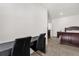 Bedroom with a dark desk, modern leather chairs, and a bed with dark furniture at 2224 Tay Wes Dr, St Cloud, FL 34771