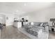 Cozy living room featuring comfortable seating, ample natural light, and open layout at 2224 Tay Wes Dr, St Cloud, FL 34771