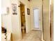 Bathroom with a tiled floor, walk-in shower, and a door to the outside at 236 Boxwood Dr, Davenport, FL 33837