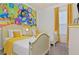 Bright bedroom featuring themed decorations, twin beds, and a window for natural light at 236 Boxwood Dr, Davenport, FL 33837