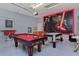 Spacious game room features a pool table, foosball table, and Star Wars themed mural at 236 Boxwood Dr, Davenport, FL 33837