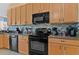 Well-equipped kitchen with granite countertops and stainless steel appliances at 236 Boxwood Dr, Davenport, FL 33837