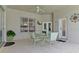 Relaxing outdoor patio with seating and a ceiling fan at 236 Boxwood Dr, Davenport, FL 33837