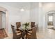 Cozy dining area with a glass table and seating for four offers a pleasant space for meals at 2481 Deer Creek Blvd, St Cloud, FL 34772