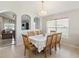 Inviting dining area with natural light and views into the living room at 2481 Deer Creek Blvd, St Cloud, FL 34772