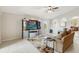 Relaxing living area with modern entertainment center and neutral color palette at 2481 Deer Creek Blvd, St Cloud, FL 34772