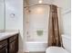 Bathroom with a shower-tub combination, modern vanity, and neutral decor at 2641 Hemingway Ave, Haines City, FL 33844
