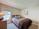 A bedroom featuring a comfortable bed, providing a cozy space for rest and relaxation at 2641 Hemingway Ave, Haines City, FL 33844