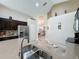 Kitchen sink area with stainless steel appliances and breakfast bar at 2641 Hemingway Ave, Haines City, FL 33844