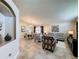 Spacious living room showcasing tile floors, neutral decor, and comfortable seating arrangements at 2641 Hemingway Ave, Haines City, FL 33844