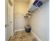Walk-in closet complete with shelving and hanging space for optimal storage at 2641 Hemingway Ave, Haines City, FL 33844