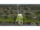 An aerial view of a property outlines the home, highlighting its proximity to the lake and private dock at 2658 Adele Pl, Lake Mary, FL 32746