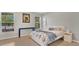 Cozy bedroom with natural light, neutral tones, and stylish decor at 2658 Adele Pl, Lake Mary, FL 32746