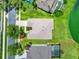 Birds-eye view of the property's roof, driveway, and surrounding landscaped yard at 2710 Gorst Rd, Winter Garden, FL 34787