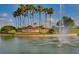 Attractive community entrance with a water fountain, lush landscaping, and a welcoming sign at 2710 Gorst Rd, Winter Garden, FL 34787