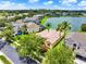 Aerial view of the property showcasing the home's proximity to the lake and mature landscaping at 2710 Gorst Rd, Winter Garden, FL 34787