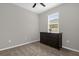 Bedroom with neutral walls, carpet, ceiling fan and a dresser at 284 White Heron Way, St Cloud, FL 34772
