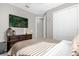 Comfortable bedroom with a TV, dresser, closet and a view of outdoors at 284 White Heron Way, St Cloud, FL 34772