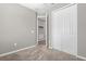 Bedroom features carpet, closet with bi-fold doors and neutral paint at 284 White Heron Way, St Cloud, FL 34772