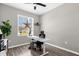 Functional home office with a streamlined desk, modern chair, and pleasant natural light at 284 White Heron Way, St Cloud, FL 34772