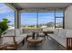 Screened patio with outdoor furniture and neighborhood view at 284 White Heron Way, St Cloud, FL 34772