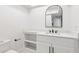 Modern bathroom with speckled quartz counters and black hardware at 2903 Clear Way, Orlando, FL 32805