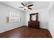 Bedroom with a wood dresser, ceiling fan, and hardwood floors at 2903 Clear Way, Orlando, FL 32805