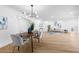 Open-concept dining area perfect for gatherings, featuring stylish lighting and seamless flow to living spaces at 2903 Clear Way, Orlando, FL 32805