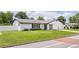 Charming exterior of a home showcasing a well-manicured lawn and inviting curb appeal at 2903 Clear Way, Orlando, FL 32805