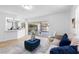 Cozy living room with direct access to outdoor patio, ideal for indoor-outdoor living and entertainment at 2903 Clear Way, Orlando, FL 32805