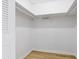 Walk-in closet with a single shelf and chrome clothes rod at 2903 Clear Way, Orlando, FL 32805