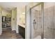 Bathroom with shower, double vanity and walk-in closet at 2941 Marlberry Ln, Clermont, FL 34714
