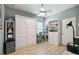 Versatile bedroom featuring a Murphy bed and built-in shelving for storage at 2941 Marlberry Ln, Clermont, FL 34714