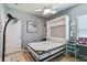 Additional bedroom area with Murphy bed, ideal for flexible living arrangements at 2941 Marlberry Ln, Clermont, FL 34714
