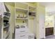 Organized closet with shelves, drawers, and ample storage space at 2941 Marlberry Ln, Clermont, FL 34714
