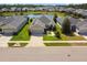 Beautiful single-Gathering home with a two-car garage, well-manicured lawn, and serene water view at 2941 Marlberry Ln, Clermont, FL 34714