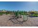 View of the community playground, featuring green climbing structures and shaded benches at 2941 Marlberry Ln, Clermont, FL 34714