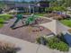 The community playground has slides, climbing equipment, and shaded seating at 2941 Marlberry Ln, Clermont, FL 34714