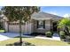 Charming single-story home featuring a well-manicured lawn, a two-car garage, and lovely landscaping at 30245 Cheval St, Mount Dora, FL 32757