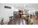 Bright kitchen featuring an island with seating, granite countertops and stainless steel appliances at 30245 Cheval St, Mount Dora, FL 32757