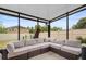 Covered and screened outdoor patio featuring a modular sectional sofa with an open view at 30245 Cheval St, Mount Dora, FL 32757