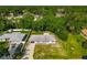 Charming single-story home with a spacious front yard, complemented by mature trees, offering curb appeal at 3104 Lime Tree Dr, Edgewater, FL 32141