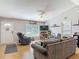 Inviting living room with neutral walls, a ceiling fan, and comfortable seating at 3104 Lime Tree Dr, Edgewater, FL 32141