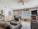 This is a bright living room showcasing neutral colors and ample natural light at 3104 Lime Tree Dr, Edgewater, FL 32141