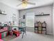 Bright office with a desk, storage units, and natural light from a window at 3104 Lime Tree Dr, Edgewater, FL 32141