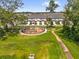 Aerial view of community playground with surrounding homes, great for outdoor activities at 3206 Water Sprite St, Orlando, FL 32808