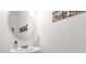 Clean powder room featuring modern fixtures, stylish decor, and a minimalist design at 3206 Water Sprite St, Orlando, FL 32808