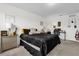 Well-lit bedroom with large bed, bedside tables, and comfortable workspace at 3206 Water Sprite St, Orlando, FL 32808