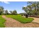 Park with grass, walking path, seating and trash receptacles, great for relaxing and enjoying nature at 3206 Water Sprite St, Orlando, FL 32808